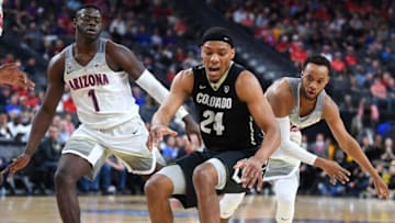 Mar 8, 2018; Las Vegas, NV, USA; Colorado Buffaloes guard George King (24) loses the ball between Arizona Wildcats guard Rawle Alkins (1) and forward Ira Lee (11) during a Pac-12 Tournament quarterfinals match at T-Mobile Arena. Mandatory Credit: Stephen R. Sylvanie-USA TODAY Sports