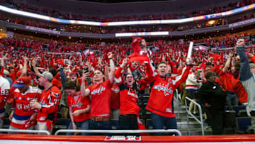 WASHINGTON, DC - JUNE 07: Fans celebrate after a goal by the Washington Capitals on June 7, 2018, at the Capital One Arena in Washington, D.C. in Game 5 of the Stanley Cup Playoffs. The Washington Capitals defeated the Vegas Golden Knights. 4-3 to win the Stanley Cup. (Photo by Mark Goldman/Icon Sportswire via Getty Images)