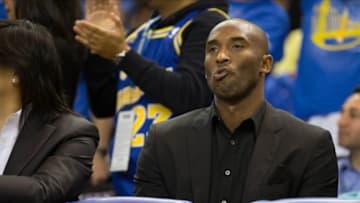 Oct 30, 2013; Oakland, CA, USA; Los Angeles Lakers shooting guard Kobe Bryant (24) behind the bench against the Golden State Warriors during the third quarter at Oracle Arena. The Golden State Warriors defeated the Los Angeles Lakers 125-94. Mandatory Credit: Kelley L Cox-USA TODAY Sports