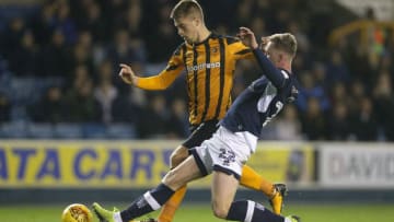 LONDON, ENGLAND - NOVEMBER 21: Aiden O'Brien of Millwall tackles Markus Henriksen of Hull City during the Sky Bet Championship match between Millwall and Hull City at The Den on November 21, 2017 in London, England. (Photo by James Chance/Getty Images)