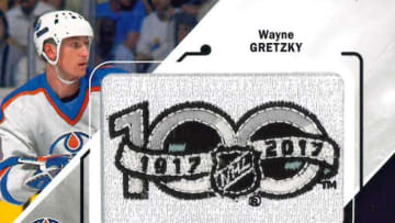 A Wayne Gretzky 100-Year Anniversary Patches card from the newly-released 2017-18 Upper Deck hockey set. Photo courtesy of Upper Deck.