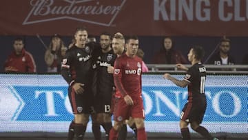 Oct 1, 2016; Toronto, Ontario, CAN; D.C. United midfielder Lamar Neagle (13) celebrates scoring a goal with D.C. United defender Bobby Boswell (32) during the first half in a game against Toronto FC at BMO Field. Mandatory Credit: Nick Turchiaro-USA TODAY Sports