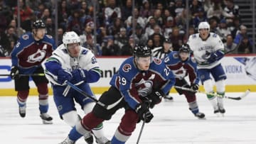 DENVER, CO - FEBRUARY 02: Colorado Avalanche center Nathan MacKinnon (29) races down ice with the puck with Vancouver Canucks center Bo Horvat (53) in tow in the third period at the Pepsi Center February 01, 2019. (Photo by Andy Cross/The Denver Post via Getty Images)