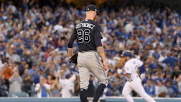LOS ANGELES, CA - OCTOBER 04: Mike Foltynewicz #26 of the Atlanta Braves reacts as Max Muncy #13 of the Los Angeles Dodgers rounds the bases after his second inning three run home run during Game One of the National League Division Series at Dodger Stadium on October 4, 2018 in Los Angeles, California. (Photo by Harry How/Getty Images)