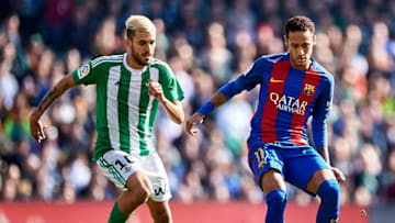 SEVILLE, SPAIN - JANUARY 29: Neymar Jr of FC Barcelona (R) being followed by Dani Ceballos of Real Betis Balompie (L) during the La Liga match between Real Betis Balompie and FC Barcelona at Benito Villamarin Stadium on January 29, 2017 in Seville, Spain. (Photo by Aitor Alcalde/Getty Images)