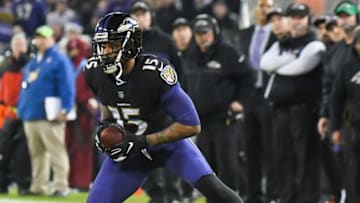 BALTIMORE, MD - DECEMBER 30, 2018: Wide receiver Michael Crabtree #15 of the Baltimore Ravens carries the ball in the second quarter of a game against the Cleveland Browns on December 30, 2018 at M&T Bank Stadium in Baltimore, Maryland. Baltimore won 26-24. (Photo by: 2018 Nick Cammett/Diamond Images/Getty Images)