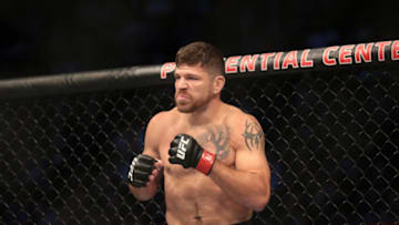 Aug 3, 2019; Newark, NJ, USA; Jim Miller (red gloves) fights Clay Guida (blue gloves) during UFC Fight Night at Prudential Center. Mandatory Credit: Vincent Carchietta-USA TODAY Sports