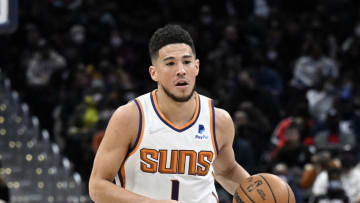 Devin Booker and the Suns take on the 76ers tonight at 5:00 PM MST (Photo by G Fiume/Getty Images)