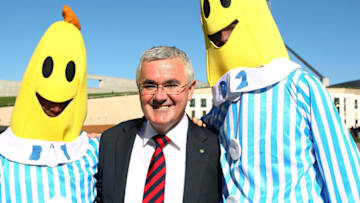 CANBERRA, AUSTRALIA - MAY 13: Independent Andrew Wilkie poses with the ABC characters Bananas in Pyjamas during an ABC protest rally outside of Parliament House on May 13, 2014 in Canberra, Australia. Tony Abbott's Coalition government will deliver it's first federal budget tonight and is expected to reveal several welfare spending cuts and tax increases as well as increases in defence and infrastructure spending. (Photo by Stefan Postles/Getty Images)