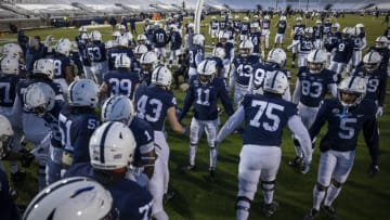 Penn State Nittany Lions players take the field (Photo by Scott Taetsch/Getty Images)