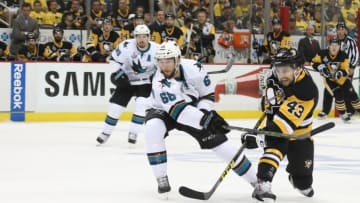Jun 9, 2016; Pittsburgh, PA, USA; Pittsburgh Penguins left wing Conor Sheary (43) shoots against San Jose Sharks right wing Melker Karlsson (68) in the second period in game five of the 2016 Stanley Cup Final at Consol Energy Center. Mandatory Credit: Charles LeClaire-USA TODAY Sports
