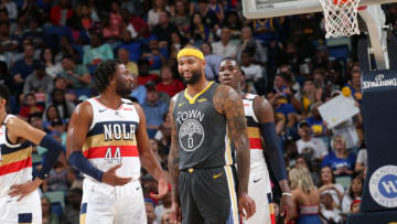 NEW ORLEANS, LA - APRIL 9: Solomon Hill #44 of the New Orleans Pelicans talks with DeMarcus Cousins #0 of the Golden State Warriors during the game on April 9, 2019 at the Smoothie King Center in New Orleans, Louisiana. NOTE TO USER: User expressly acknowledges and agrees that, by downloading and or using this Photograph, user is consenting to the terms and conditions of the Getty Images License Agreement. Mandatory Copyright Notice: Copyright 2019 NBAE (Photo by Layne Murdoch Jr./NBAE via Getty Images)