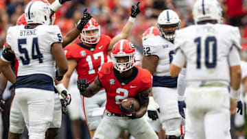 ATHENS, GA - SEPTEMBER 10: Smael Mondon Jr. #2 of the Georgia Bulldogs celebrates a fumble recovery during a game between Samford Bulldogs and Georgia Bulldogs at Sanford Stadium on September 10, 2022 in Athens, Georgia. (Photo by Steve Limentani/ISI Photos/Getty Images)