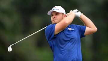 KUALA LUMPUR, MALAYSIA - JANUARY 14: Tyrell Hatton of Europe tees off during the singles matches on day three of the 2018 EurAsia Cup presented by DRB-HICOM at Glenmarie G