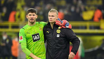 Gregor Kobel and Erling Haaland (Photo by INA FASSBENDER/AFP via Getty Images)