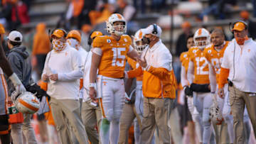 Dec 5, 2020; Knoxville, Tennessee, USA; Tennessee Volunteers head coach Jeremy Pruitt speaks with quarterback Harrison Bailey (15) during the first half against the Florida Gators at Neyland Stadium. Mandatory Credit: Randy Sartin-USA TODAY Sports