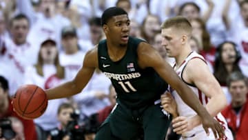 MADISON, WISCONSIN - FEBRUARY 01: Aaron Henry #11 of the Michigan State Spartans dribbles the ball while being guarded by Brevin Pritzl #1 of the Wisconsin Badgers in the second half at the Kohl Center on February 01, 2020 in Madison, Wisconsin. (Photo by Dylan Buell/Getty Images)