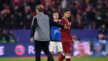 SEVILLE, SPAIN - NOVEMBER 21: Jurgen Klopp, Manager of Liverpool thanks Roberto Firmino of Liverpool after the UEFA Champions League group E match between Sevilla FC and Liverpool FC at Estadio Ramon Sanchez Pizjuan on November 21, 2017 in Seville, Spain. (Photo by David Ramos/Getty Images)