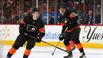 PHILADELPHIA, PA - JANUARY 11: Joel Farabee #49 and Nicolas Aube-Kubel #62 of the Philadelphia Flyers in action against the Tampa Bay Lightning at the Wells Fargo Center on January 11, 2020 in Philadelphia, Pennsylvania. The Lightning defeated the Flyers 1-0. (Photo by Mitchell Leff/Getty Images)