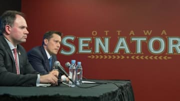 May 9, 2016; Ottawa, Ontario, CAN; Ottawa Senators general manager Pierre Dorion and new head coach Guy Boucher speak to the media at a press conference at the Canadian Tire Centre. Mandatory Credit: Marc DesRosiers-USA TODAY Sports