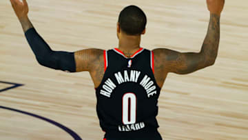 LAKE BUENA VISTA, FLORIDA - AUGUST 15: Damian Lillard #0 of the Portland Trail Blazers calls for a foul against the Memphis Grizzlies during the fourth quarter in the Western Conference play-in game one at The Field House at ESPN Wide World Of Sports Complex on August 15, 2020 in Lake Buena Vista, Florida. (Photo by Kevin C. Cox/Getty Images)