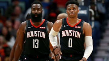 Former OKC Thunder players James Harden #13 and Russell Westbrook #0 of the Houston Rockets stand on the court during a NBA game . (Photo by Sean Gardner/Getty Images)