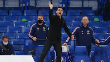 LONDON, ENGLAND - MAY 12: Mikel Arteta, Manager of Arsenal gives his team instructions during the Premier League match between Chelsea and Arsenal at Stamford Bridge on May 12, 2021 in London, England. Sporting stadiums around the UK remain under strict restrictions due to the Coronavirus Pandemic as Government social distancing laws prohibit fans inside venues resulting in games being played behind closed doors. (Photo by Marc Atkins/Getty Images)