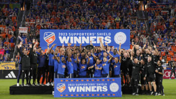 CINCINNATI, OHIO - OCTOBER 04: Luciano Acosta #10 of FC Cincinnati celebrates with teammates after receiving the Supporter's Shield following a MLS soccer match against the New York Red Bulls at TQL Stadium on October 04, 2023 in Cincinnati, Ohio. (Photo by Jeff Dean/Getty Images)
