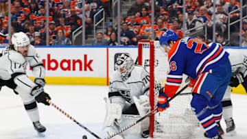 Los Angeles Kings forward Zack MacEwen (17) blocks a shot by Edmonton Oilers forward Mattias Janmark (26) Mandatory Credit: Perry Nelson-USA TODAY Sports