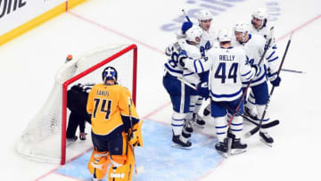 Toronto Maple Leafs players celebrate after a goal past Nashville Predators goaltender Juuse Saros (74): Christopher Hanewinckel-USA TODAY Sports