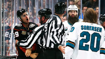 ANAHEIM, CA - OCTOBER 28: Joseph Blandisi #39 of the Anaheim Ducks battles after the whistle against Brent Burns #88 and Marcus Sorensen #20 of the San Jose Sharks during the game on October 28, 2018 at Honda Center in Anaheim, California. (Photo by Debora Robinson/NHLI via Getty Images)