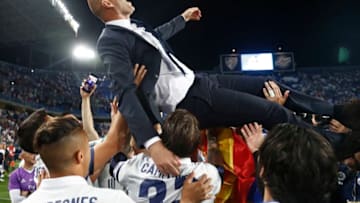 MALAGA, SPAIN - MAY 21: Zinedine Zidane, Manager of Real Madrid celebrates with his players after being crowned champions following the La Liga match between Malaga and Real Madrid at La Rosaleda Stadium on May 21, 2017 in Malaga, Spain. (Photo by Helios de la Rubia/Real Madrid via Getty Images)