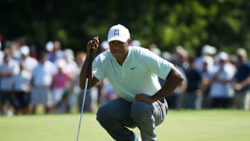 NEWTOWN SQUARE, PA - SEPTEMBER 06: Tiger Woods of the United States lines up a putt on the first green during the first round of the BMW Championship at Aronimink Golf Club on September 6, 2018 in Newtown Square, Pennsylvania. (Photo by Gregory Shamus/Getty Images)