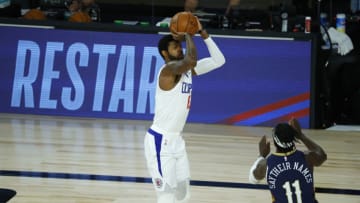 Paul George #13 of the LA Clippers shoots against the New Orleans Pelicans . (Photo by Kevin C. Cox/Getty Images)