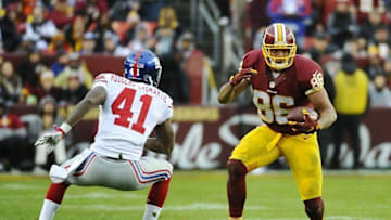 Nov 29, 2015; Landover, MD, USA; Washington Redskins tight end Jordan Reed (86) carries the ball as New York Giants cornerback Dominique Rodgers-Cromartie (41) defends during the second half at FedEx Field. The Redskins won 20-14. Mandatory Credit: Brad Mills-USA TODAY Sports