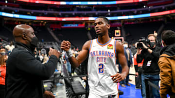 Shai Gilgeous-Alexander #2 of the OKC Thunder gives fists bumps after the game against the Pistons. (Photo by Nic Antaya/Getty Images)