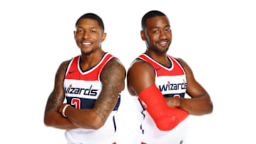 WASHINGTON, DC - SEPTEMBER 25: Bradley Beal #3 and John Wall #2 of the Washington Wizards pose for a portrait during Media Day on September 25, 2017 at Capital One Center in Washington DC. NOTE TO USER: User expressly acknowledges and agrees that, by downloading and or using this photograph, User is consenting to the terms and conditions of the Getty Images License Agreement. Mandatory Copyright Notice: Copyright 2017 NBAE (Photo by Ned Dishman/NBAE via Getty Images)