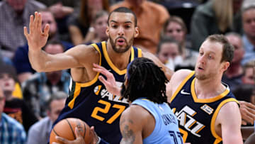 SALT LAKE CITY, UT - NOVEMBER 02: Rudy Gobert #27 and Joe Ingles #2 of the Utah Jazz defend against Mike Conley #11 of the Memphis Grizzlies in the second half of a NBA game at Vivint Smart Home Arena on November 2, 2018 in Salt Lake City, Utah. NOTE TO USER: User expressly acknowledges and agrees that, by downloading and or using this photograph, User is consenting to the terms and conditions of the Getty Images License Agreement. (Photo by Gene Sweeney Jr./Getty Images)