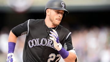 Apr 10, 2016; Denver, CO, USA; Colorado Rockies shortstop Trevor Story (27) rounds the bases after hitting a solo home run eighth inning against the San Diego Padres at Coors Field. The Rockies defeated the Padres 6-3. Mandatory Credit: Ron Chenoy-USA TODAY Sports