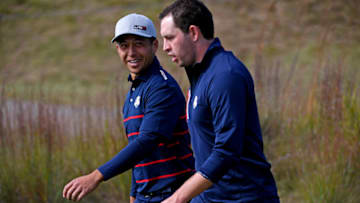 Sep 24, 2021; Haven, Wisconsin, USA; Team USA player Xander Schauffele and Team USA player Patrick Cantlay on the 15th hole during day one four ball matches for the 43rd Ryder Cup golf competition at Whistling Straits. Mandatory Credit: Orlando Ramirez-USA TODAY Sports