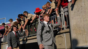 Sep 17, 2022; Columbus, Ohio, USA; Ohio State Buckeyes quarterback Devin Brown and quarterback Kyle McCord high five fans prior to the NCAA Division I football game against the Toledo Rockets at Ohio Stadium. Mandatory Credit: Adam Cairns-The Columbus DispatchNcaa Football Toledo Rockets At Ohio State Buckeyes