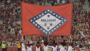 Sep 17, 2016; Fayetteville, AR, USA; Arkansas Razorbacks cheerleaders display a large flag during the second half against the Texas State Bobcats at Donald W. Reynolds Razorback Stadium. Arkansas won 42-3. Mandatory Credit: Denny Medley-USA TODAY Sports