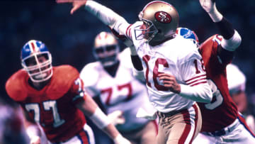 28 Jan 1990: Quarterback Joe Montana of the San Francisco 49ers throws while pressured during the 49ers 55-10 victory over the Denver Broncos in Super Bowl XXIV at the Louisiana Superdome in New Orleans, LA. (Photo by Icon Sportswire)