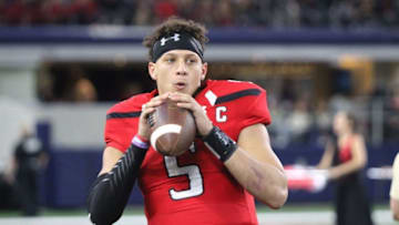 Nov 25, 2016; Arlington, TX, USA; Texas Tech Red Raiders quarterback Patrick Mahomes (5) warms up on the bench during the game against the Baylor Bears at AT&T Stadium. Texas Tech defeated Baylor 54-35. Mandatory Credit: Michael C. Johnson-USA TODAY Sports