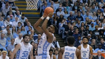 CHAPEL HILL, NC - DECEMBER 06: Brandon Huffman #42 of the North Carolina Tar Heels pulls down a rebound against the Western Carolina Catamounts during their game at the Dean Smith Center on December 6, 2017 in Chapel Hill, North Carolina. (Photo by Grant Halverson/Getty Images)