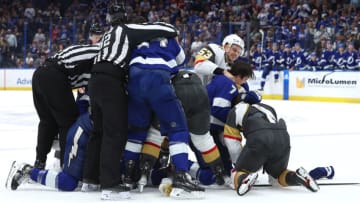 Mar 9, 2023; Tampa, Florida, USA; Vegas Golden Knights center Teddy Blueger (53), Tampa Bay Lightning defenseman Haydn Fleury (7) and teammates fight during the third period at Amalie Arena. Mandatory Credit: Kim Klement-USA TODAY Sports