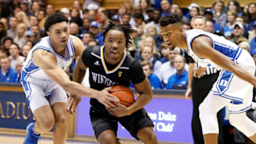 Duke basketball players Jordan Goldwire and Javin DeLaurier (Photo by Bob Leverone/Getty Images)