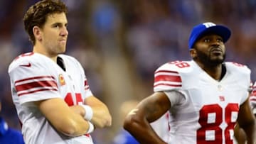 Dec 22, 2013; Detroit, MI, USA; New York Giants quarterback Eli Manning (10) and wide receiver Hakeem Nicks (88) on the sidelines during the fourth quarter against the Detroit Lions at Ford Field. Mandatory Credit: Andrew Weber-USA TODAY Sports