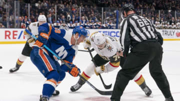 UNIONDALE, NY - DECEMBER 05: New York Islanders Center Brock Nelson (29) and Vegas Golden Knights Center William Karlsson (71) face off during the overtime period of the National Hockey League game between the Las Vegas Golden Knights and the New York Islanders on December 5, 2019, at the Nassau Veterans Memorial Coliseum in Uniondale, NY. (Photo by Gregory Fisher/Icon Sportswire via Getty Images)
