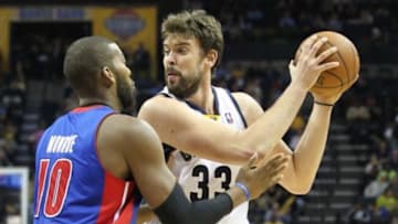 Nov 30, 2012; Memphis, TN, USA; Memphis Grizzlies center Marc Gasol (33) drives against Detroit Pistons center Greg Monroe (10) at the FedEx Forum. Memphis defeated Detroit 90-78. Mandatory Credit: Nelson Chenault-USA TODAY Sports